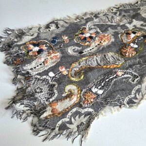 Embroidered bohemian style scarf.